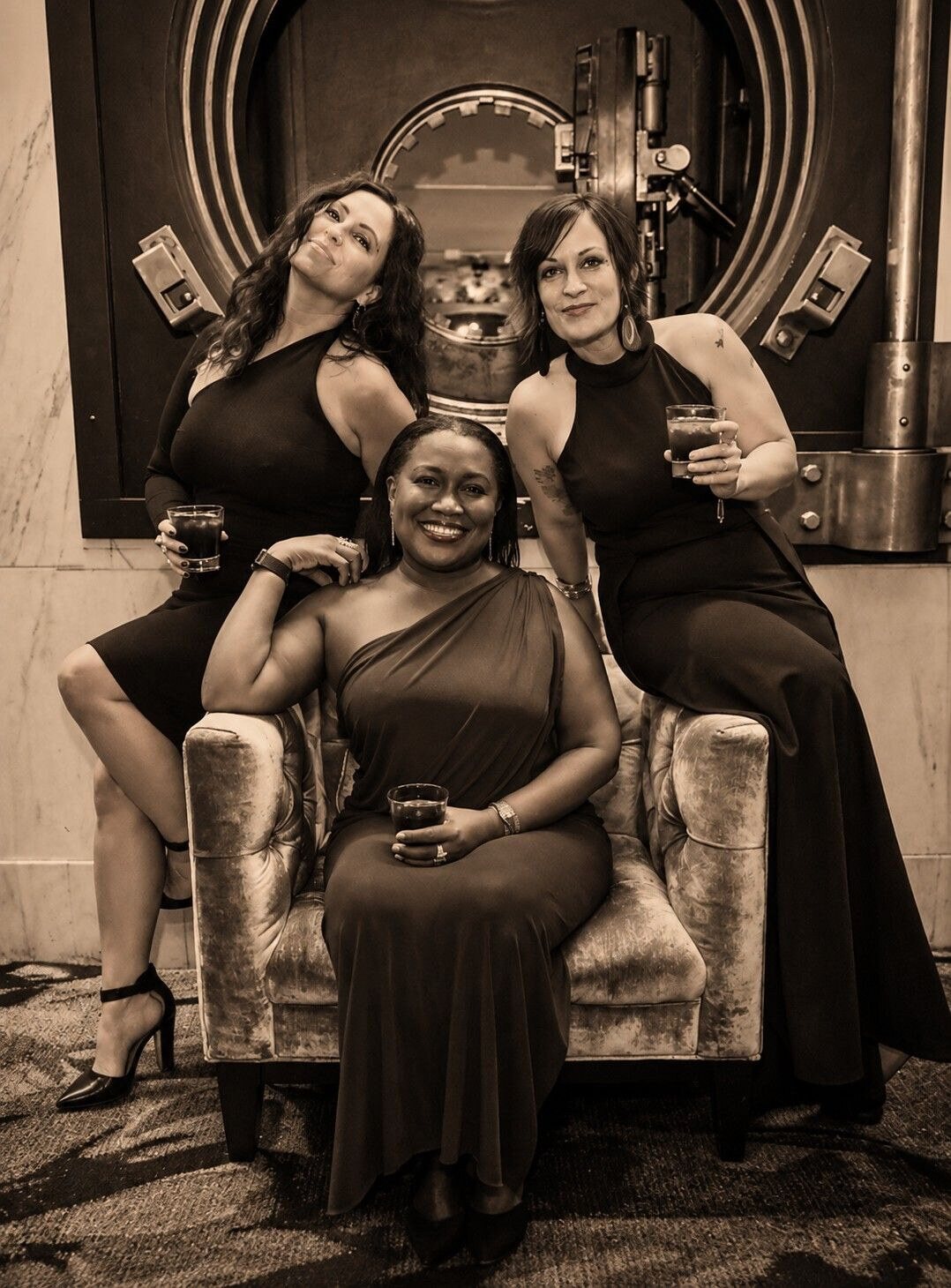 Women gathered at The Vault at Metropolitan 9 for an Embrace book signing